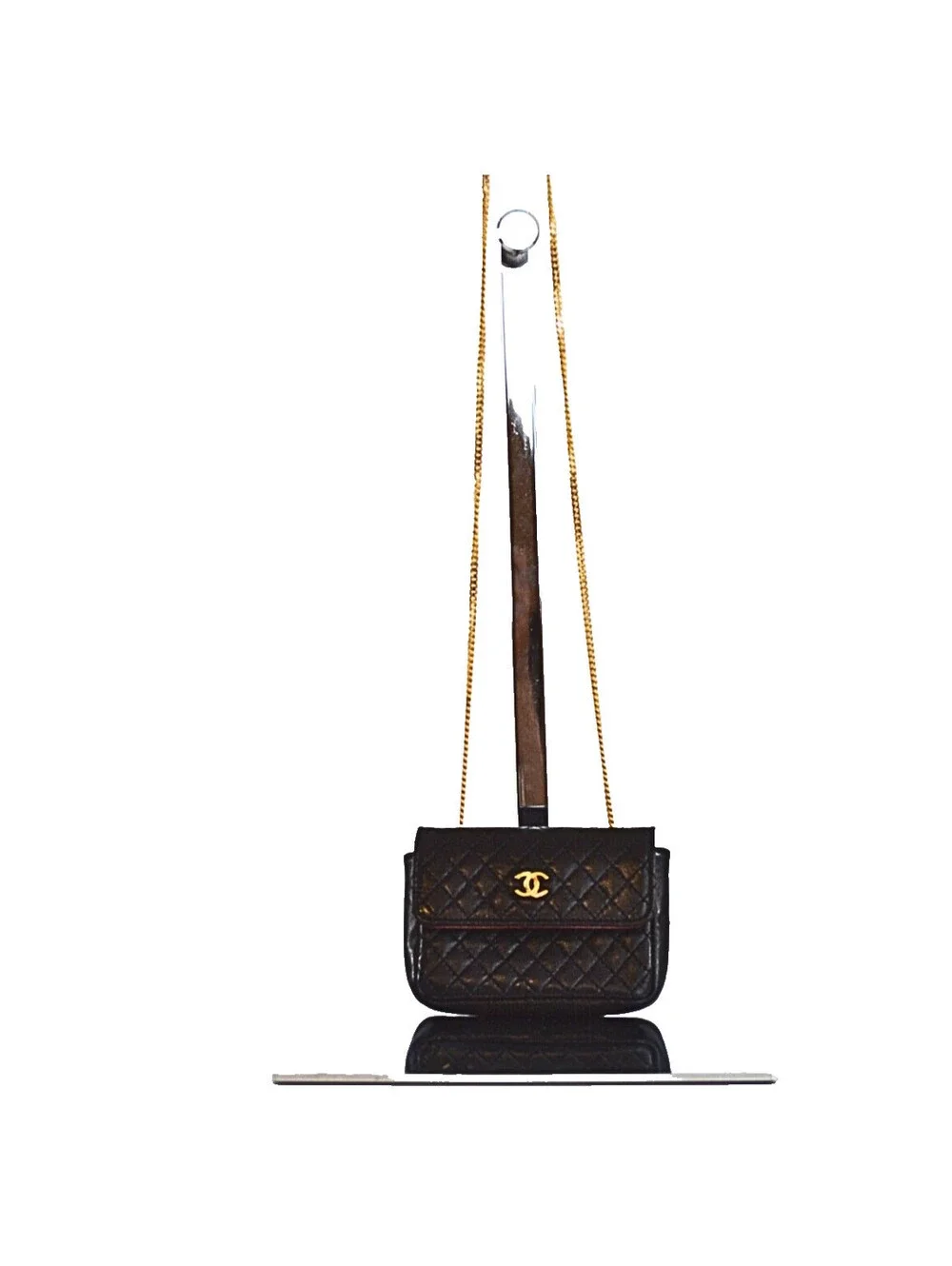 Chanel A Black Quilted Lambskin Leather Micro Flap Bag With Gold Hardware